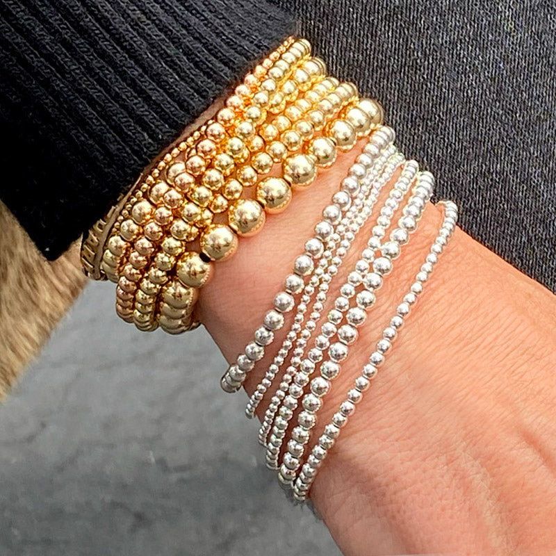 Leah Jessica sterling silver and 14k gold filled bracelets that are stretch to fit and stackable