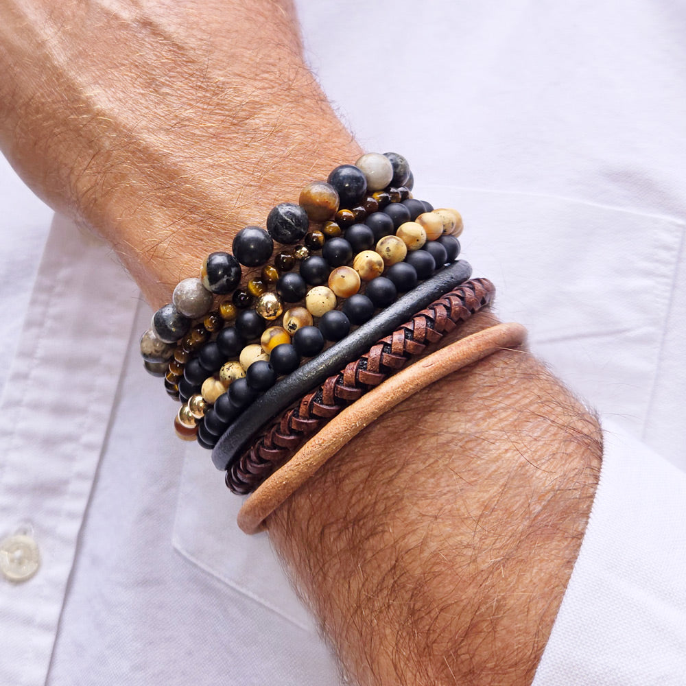 Men&#39;s Lando Grey Leather Bracelet w Magnetic Clasp shown with the Ellis and Max leather bracelets stacked with our men&#39;s gemstone bracelets