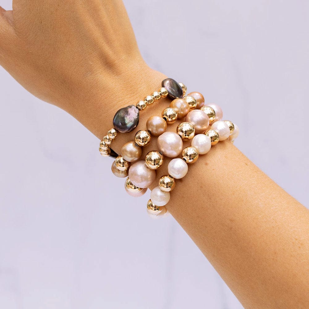 4mm 14k gold filled bracelet with large black pearls stacked with 8mm 14k gold filled bracelet with large pink pearls