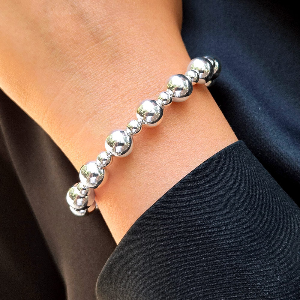 Sterling Silver 9mm & 4mm Bead Stretch to Fit Bracelet Bracelet Size: 6.5 INCH