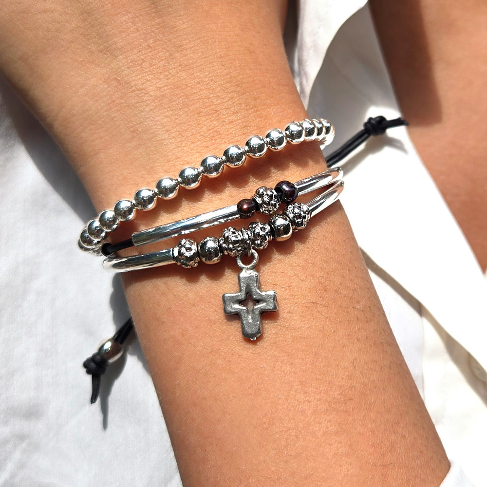 Faith Silver and Leather Pearl Bracelet with Open Cross Charm Next to 5mm Sterling Silver Bracelet White