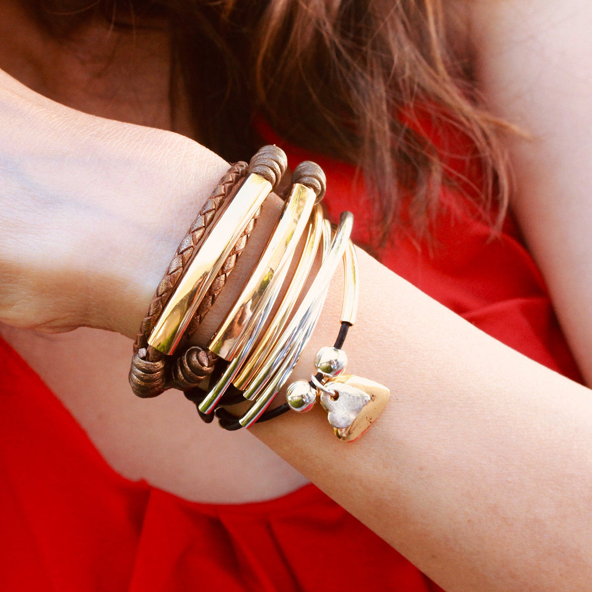 Perfect Pair Engravable Bracelet - Gold stacked next to the Girlfriend with silver and gold heart charms, bracelets sold separately