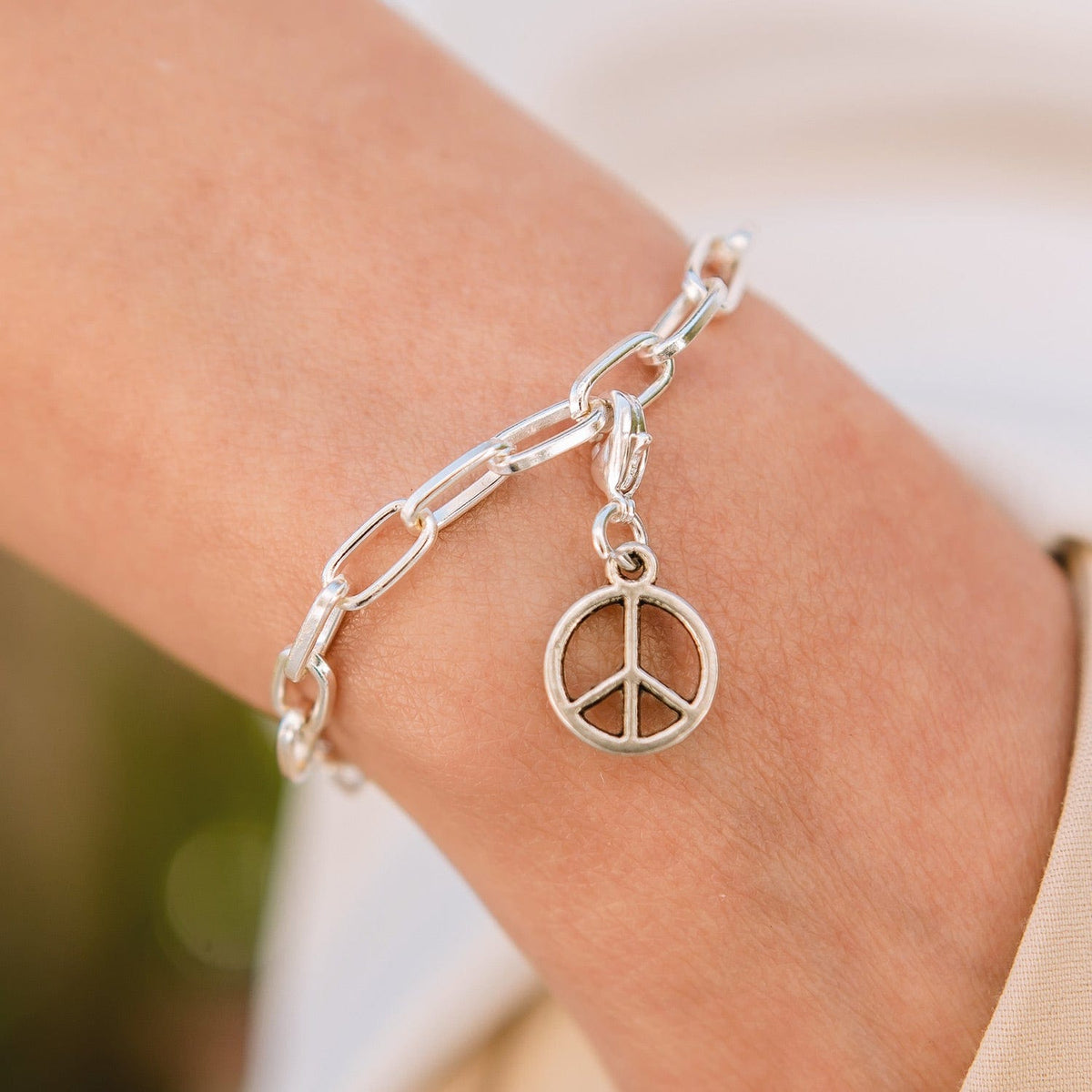 Seville Silver Bracelet with Silver Peace Sign Charm